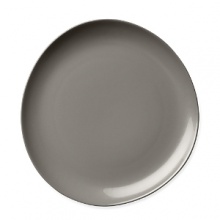 Borrowing from nature, this porcelain dinner plate has a highly glossed surface and unusual contours, creating an interesting silhouette - a DVF signature - on the table. Borrowing from nature, this porcelain dinner plate has a highly glossed surface and unusual contours, creating an interesting silhouette - a DVF signature - on the table.