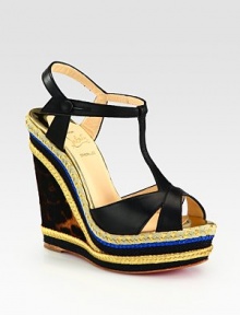 Soft leather t-strap set atop a leopard-print pony hair wedge with espadrille trim and an adjustable ankle strap. Dyed pony hair wedge with hemp trim, 5 (125mm)Hemp and Lurex platform, 1½ (40mm)Compares to a 3½ heel (90mm)Leather upperLeather liningSignature red leather solePadded insoleImportedOUR FIT MODEL RECOMMENDS ordering one size up as this style runs small. Soft leather t-strap set atop a leopard-print pony hair wedge with espadrille trim and an adjustable ankle strap. Dyed pony hair wedge with hemp trim, 5 (125mm)Hemp and Lurex platform, 1½ (40mm)Compares to a 3½ heel (90mm)Leather upperLeather liningSignature red leather solePadded insoleImportedOUR FIT MODEL RECOMMENDS ordering one size up as this style runs small.