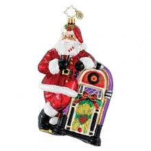A jolly Santa kicks back with a cold drink and holiday tunes. A jolly Santa kicks back with a cold drink and holiday tunes.