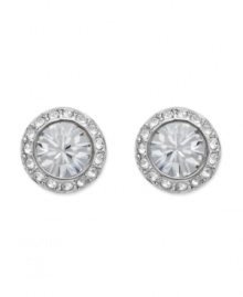 Add spark to your style with subtle fashion. Swarovski's chic, circular studs feature a round-cut crystal center stone surrounded by sparkling crystal edges. Crafted in silver tone mixed metal. Approximate diameter: 1/3 inch. Add spark to your style with subtle fashion. Swarovski's chic, circular studs feature a round-cut crystal center stone surrounded by sparkling crystal edges. Crafted in silver tone mixed metal. Approximate diameter: 1/3 inch.