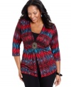Be a fashionable standout with Elementz' three-quarter sleeve plus size top, accented by a striking medallion!