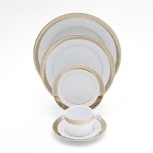 This exquisite formal collection is made from the finest Limoges porcelain. Adorned with ornate platinum accents and shimmering gold, it adds luxurious style to any table. This exquisite formal collection is made from the finest Limoges porcelain. Adorned with ornate platinum accents and shimmering gold, it adds luxurious style to any table.