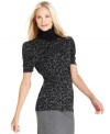 Add some animal-print panache to your next outfit with this petite turtleneck sweater from Style&co.