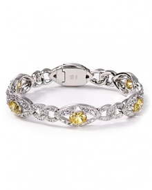 Nadri's striking canary-yellow bracelet is designed to add a flourish to your evening ensembles, featuring dazzling crystals and stones. Nadri's striking canary-yellow bracelet is designed to add a flourish to your evening ensembles, featuring dazzling crystals and stones.