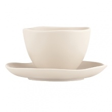 Featuring an organic shape and a matte glaze finish, this bowl and saucer are thoroughly modern and impart natural sophistication. Featuring an organic shape and a matte glaze finish, this bowl and saucer are thoroughly modern and impart natural sophistication.