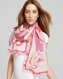 Floral shapes twist and turn down this elegant oblong scarf from Emilio Pucci. Floral shapes twist and turn down this elegant oblong scarf from Emilio Pucci.