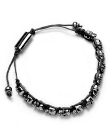 Subtle edginess. Ali Khan's silver and hematite-plated mixed metal bracelet features several tiny skulls along a black-colored cord. Bracelet is fully adjustable. Approximate length: 12 inches. Approximate diameter: 2 inches. Subtle edginess. Ali Khan's silver and hematite-plated mixed metal bracelet features several tiny skulls along a black-colored cord. Bracelet is fully adjustable. Approximate length: 12 inches. Approximate diameter: 2 inches.