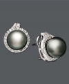 Every woman deserves a little extra glitz and glamour. These scintillating studs should do just the trick. Earrings feature a cultured Tahitian pearl at center (11-12 mm) with round-cut diamonds surrounding (3/4 ct. t.w.). Set in 14k white gold. Approximate diameter: 1 inch.
