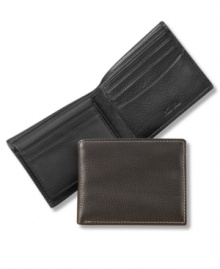 Soft and luxurious sheepskin lines this sophisticated wallet from Tasso Elba. Soft and luxurious sheepskin lines this sophisticated wallet from Tasso Elba.