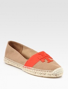 A go-to favorite in luxe canvas with contrasting leather trim and textured rope edging. Covered platform, 1 (25mm)Canvas upper with leather trimCanvas liningRubber solePadded insoleImported