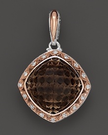 Diamonds, set in sterling silver and 18K. pink gold, frame a cushion cut smoky quartz. By Tacori. Diamonds, set in sterling silver and 18K. pink gold, frame a cushion cut smoky quartz. By Tacori.
