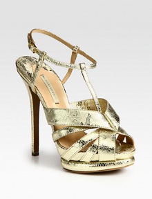Glimmering lace-print metallic leather design features an adjustable ankle strap and island platform. Self-covered heel, 5 (125mm)Island platform, 1½ (40mm)Compares to a 3½ heel (90mm)Lace-print metallic leather upperLeather lining and solePadded insoleMade in ItalyOUR FIT MODEL RECOMMENDS ordering one size up as this style runs small. Glimmering lace-print metallic leather design features an adjustable ankle strap and island platform. Self-covered heel, 5 (125mm)Island platform, 1½ (40mm)Compares to a 3½ heel (90mm)Lace-print metallic leather upperLeather lining and solePadded insoleMade in ItalyOUR FIT MODEL RECOMMENDS ordering one size up as this style runs small.