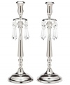 Rekindle the elegance of another era with silver-plated candlesticks from Lighting by Design. Faceted crystal beads adorn a stately silhouette, creating instant drama in a living or dining room.
