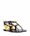 With their cool colorblocking and graphic look, Ralph Lauren Collections two-tone leather sandals are a sleek take on warm weather sophistication - Thong strap, double buckled ankle straps - Flat - Wear with crisp tailored dresses and a splash of colorful accessories