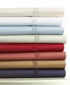 Wake up in luxury every morning with this Carlisle fitted sheet from Lauren Ralph Lauren. Features 700-thread count cotton sateen with a triple Baratta stitch along the hem. Choose from hues that range from light to dark.