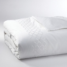For lovers of fine bed dressing, Ogee Embroidery emulates understated opulence. A sophisticated, contemporary approach to a classic ogee design. Satin stitch and twill texture embroidery create a sleek vertical line. Featured in white against white Egyptian cotton sateen. For lovers of fine bed dressing, Ogee Embroidery emulates understated opulence. A sophisticated, contemporary approach to a classic ogee design. Satin stitch and twill texture embroidery create a sleek vertical line. Featured in white against white Egyptian cotton sateen.