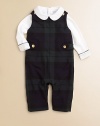 An essential, classic set pairs a preppy plaid overall with a soft cotton jersey bodysuit. Bodysuit Club collarLong sleevesBack snapsBottom snaps Overall SleevelessShoulder straps with adjustable buttonsWaist button tabsBottom snapsCottonMachine washImported Please note: Number of buttons may vary depending on size ordered. 