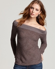 An off-the-shoulder silhouette offers a subtle peek of skin on this James Perse ribbed sweater. An off-the-shoulder silhouette offers a subtle peek of skin on this James Perse ribbed sweater.