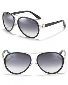 The classic aviator gets an update with thick rimmed lenses and a thin, almost invisible double bridge design. The classic aviator gets an update with thick rimmed lenses and a thin, almost invisible double bridge design.
