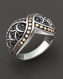 John Hardy's dragon-inspired Naga line adds this elegant ring to the mix. Its sweeping cross-over pattern is adorned with gold studs and silver scale overlays over clusters of black sapphire. Designed by John Hardy. John Hardy's dragon-inspired Naga line adds this elegant ring to the mix. Its sweeping cross-over pattern is adorned with gold studs and silver scale overlays over clusters of black sapphire. Designed by John Hardy.