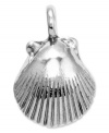 Beach chic. This pretty, detailed seashell charm comes in 14k white gold. Chain not included. Approximate length: 6/10 inch. Approximate width: 4/10 inch.