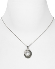 A swirling crystal pendant from Judith Jack lends shapely charm to your accessory collection. Wear this sparkling design to take every outfit from simple to striking. A swirling crystal pendant from Judith Jack lends shapely charm to your accessory collection. Wear this sparkling design to take every outfit from simple to striking.
