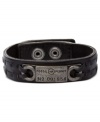 Make a fierce fashion statement with this black leather bracelet from Fossil. Silver-tone mixed metal details enhance the appeal. Adjusts to fit wrist. Approximate length: 7-7-3/4 inches.