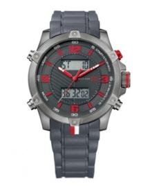 Sport functionality never looked so good. Watch by Tommy Hilfiger crafted of gray silicone bracelet and round gray ion-plated stainless steel case. Gray analog-digital dial features red numerals at twelve, three, six and nine o'clock and stick indices, three hands, two positive digital displays and logo. Quartz movement. Water resistant to 30 meters. Ten-year limited warranty.