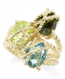 This intriguing City by City ring ties up your look with a rope-inspired design, embellished with the addition of oval-cut cubic zirconia in colorful hues: peridot, olivine and aqua (6-1/3 ct. t.w.). Set in nickel-free gold tone mixed metal. Sizes 6, 7, and 8. This intriguing City by City ring ties up your look with a rope-inspired design, embellished with the addition of oval-cut cubic zirconia in colorful hues: peridot, olivine and aqua (6-1/3 ct. t.w.). Set in nickel-free gold tone mixed metal. Sizes 6, 7, and 8.