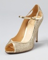 Gilded and glamourous, these glittering pumps from IVANKA TRUMP exude sparkling style. Pair them with a bejeweled clutch for a shimmering statement.