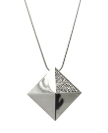 The pinnacle of good style. GUESS's pyramid-shaped pendant features a trendy long chain and sparkling crystal accents. Set in silver tone mixed metal. Approximate length: 30 inches. Approximate drop: 1-1/4 inches. The pinnacle of good style. GUESS's pyramid-shaped pendant features a trendy long chain and sparkling crystal accents. Set in silver tone mixed metal. Approximate length: 30 inches. Approximate drop: 1-1/4 inches.