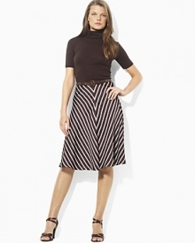 Crafted in flowing striped georgette, the Laurus skirt creates romantic movement and a chic silhouette. Crafted in flowing striped georgette, the Laurus skirt creates romantic movement and a chic silhouette.