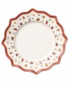 Play up the fun with this Toy's Delight dinner plate from Villeroy & Boch. Fine porcelain in a playfully ruffled shape is trimmed with intricate patterns, classic toys and festive decorations to create a magical holiday setting.