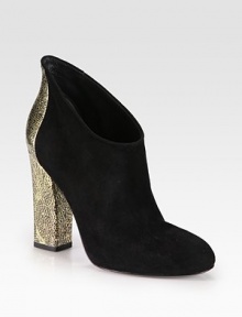 A textured metallic leather heel redefines this low-cut suede silhouette. Textured metallic leather heel, 4½ (115mm)Suede and metallic leather upperPull-on styleLeather lining and solePadded insoleImported A textured metallic leather heel redefines this low-cut suede silhouette. Textured metallic leather heel, 4½ (115mm)Suede and metallic leather upperPull-on styleLeather lining and solePadded insoleImported