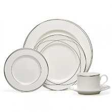 Vows teacups by Lauren by Ralph Lauren Home. Inspired by graceful curves of wedding rings, this elegant dinnerware line features interconnected platinum bands on the finest bone china. Makes a stunning table for any special occasion. Vows teacups by Lauren by Ralph Lauren Home. Inspired by graceful curves of wedding rings, this elegant dinnerware line features interconnected platinum bands on the finest bone china. Makes a stunning table for any special occasion.