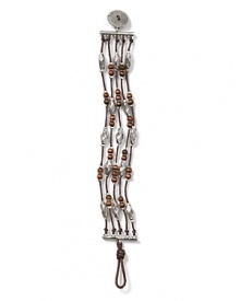 Lauren Ralph Lauren pays homage to Southwestern style with this cord bracelet, accented by an evocative mix of silver and wooden beads. Lauren Ralph Lauren pays homage to Southwestern style with this cord bracelet, accented by an evocative mix of silver and wooden beads.