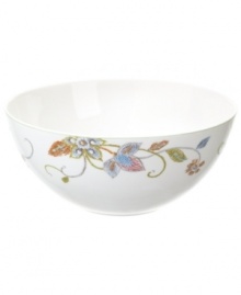 Well-crafted blooms create the illusion of texture on the sleek white porcelain of Oleg Cassini's Kavita vegetable bowl. A charming complement to the dinnerware collection. Well-crafted blooms create the illusion of texture on the sleek white porcelain of Oleg Cassini's Kavita vegetable bowl. A charming complement to the dinnerware collection.