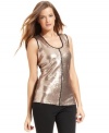 Calvin Klein's sequined top is a festive piece to layer or wear solo.
