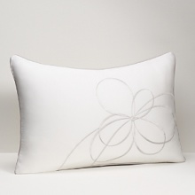 Understatedly elegant, crisp white linens are dressed up with a ribbon of silver embroidery that loops into a full bow on the duvet cover and accompanying shams. The bedskirt features a split corner pleat, accented by a ribbon of silver all around. Understatedly elegant, crisp white linens are dressed up with a ribbon of silver embroidery that loops into a full bow on the duvet cover and accompanying shams. The bedskirt features a split corner pleat, accented by a ribbon of silver all around.