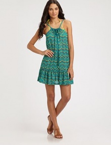 An irresistible pattern lends feminine charm to this brilliant coverup with a self-tie neckline. Self ties at necklineGold cord endsRuffle hem56% polyamide/27% polyester/17% spandexHand washImported An irresistible pattern lends feminine charm to this brilliant coverup with a self-tie neckline. Self ties at necklineGold cord endsRuffle hem56% polyamide/27% polyester/17% spandexHand washImported