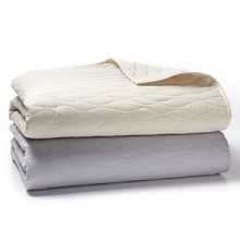 Soothing mini waves undulate across this lightweight piece-dyed quilt - a lovely layering piece for a cool summer night. Soothing mini waves undulate across this lightweight piece-dyed quilt - a lovely layering piece for a cool summer night.