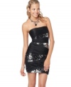 Roberta's little black dress is nothing short of sexy with trend-forward asymmetrical sequins!