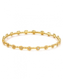 Embrace the season's eclectic approach to accessorizing with this hammered gold-plated bangle from Melinda Maria. Designed to add a touch of luxe to every look this piece is adorned with striking crystal stations. Embrace the season's eclectic approach to accessorizing with this hammered gold-plated bangle from Melinda Maria. Designed to add a touch of luxe to every look this piece is adorned with striking crystal stations.