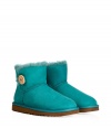 A stylish twist on a venerable classic, the UGG Australia mini Bailey Button boot is a welcome colorful addition to your cold weather casual wardrobe - Crafted from twin-faced sheepskin and featuring exposed seams, reinforced heel, traction outsole, signature UGG label, wooden button and elastic band closure, fleece-lined for superior warmth and comfort - Newer, ankle-height - Truly versatile, perfect for pairing with everything from skinny jeans to yoga pants to mini-skirts