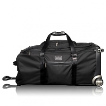 With plenty of room for clothing and gear in the spacious main compartment, plus interior and exterior accessory pockets, this extra-large wheeled duffel is ideal for recreational travel or when two are traveling together. With plenty of room for clothing and gear in the spacious main compartment, plus interior and exterior accessory pockets, this extra-large wheeled duffel is ideal for recreational travel or when two are traveling together.