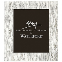 Woodgrain the alignment, texture and appearance of wood fibers plays a key role in woodworking techniques and the overall effect and impact of the finished piece. Michael Aram draws on these random natural patterns as inspiration for the Wood Grain collection of crystal barware and metal giftware in Michael Aram for Waterford.