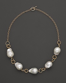 Boldly gleaming baroque freshwater pearls add rich luster to 14K yellow gold. By Nancy B. Boldly gleaming baroque freshwater pearls add rich luster to 14K yellow gold. By Nancy B.