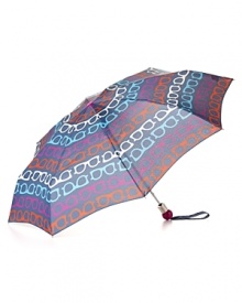 An colorfully printed umbrella with a sunny outlook. An colorfully printed umbrella with a sunny outlook.