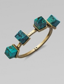 An architectural piece with four turquoise cube stones on a hinged bangle. TurquoiseBrassDiameter, about 2½Hinged closureMade in USA An architectural piece with four turquoise cube stones on a hinged bangle. TurquoiseBrassDiameter, about 2½Hinged closureMade in USA