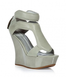 The certifiable must-have shoes of the season, these fashion-forward Camilla Skovgaard wedges are statement-making - Peep-toe, front panel with cut out detailing, ultra-high wedge heel, back zip closure - Pair with printed jeans and a blazer or an eye-catching cocktail frock The certifiable must-have shoes of the season, these fashion-forward Camilla Skovgaard wedges are statement-making - Peep-toe, front panel with cut out detailing, ultra-high wedge heel, back zip closure - Pair with printed jeans and a blazer or an eye-catching cocktail frock